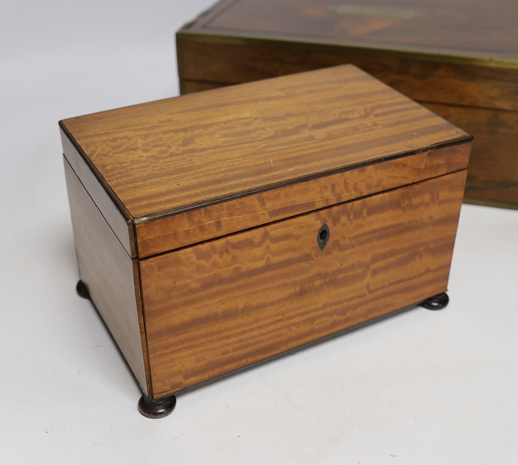 A Victorian brass bound rosewood writing box, 30.5 x 22 x 13cm, a George IV satinwood tea caddy and three Japonaise lacquered wall brackets